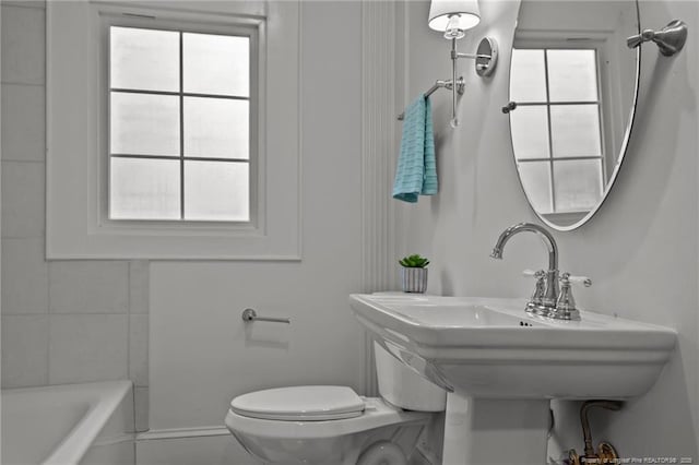 123 Ellington St, Fayetteville, NC 28305 - full bathroom with a bath, toilet, and a sink