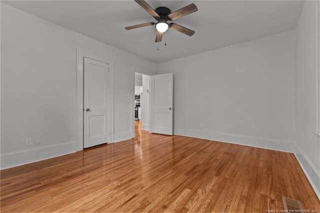 123 Ellington St, Fayetteville, NC 28305 - unfurnished bedroom with baseboards, light wood-style floors, and ceiling fan