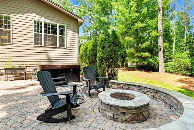 7552 Hasentree Club Dr, Wake Forest, NC 27587 - view of patio / terrace featuring a fire pit and a hot tub