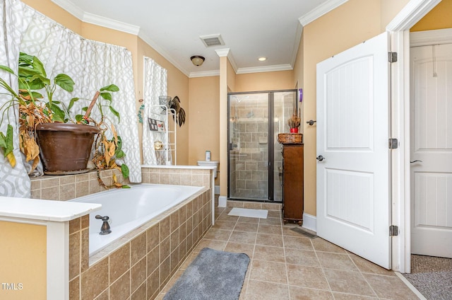 3304 Black Stallion Ct, Zebulon, NC 27597 - bathroom with a stall shower, a garden tub, crown molding, tile patterned flooring, and recessed lighting