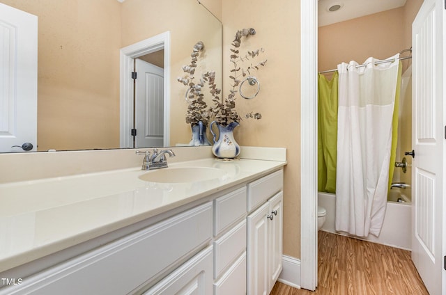 3304 Black Stallion Ct, Zebulon, NC 27597 - full bathroom with vanity, shower / tub combo with curtain, and wood finished floors