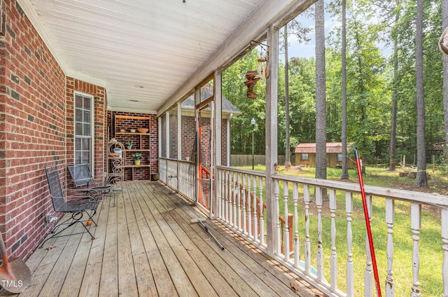 3304 Black Stallion Ct, Zebulon, NC 27597 - porch with a shed and view of wooded area