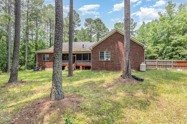 3304 Black Stallion Ct, Zebulon, NC 27597 - back of house with brick siding