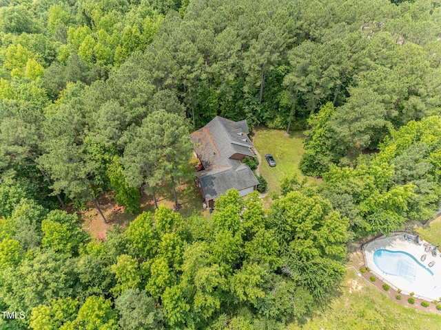 3304 Black Stallion Ct, Zebulon, NC 27597 - bird's eye view of a heavily wooded area and a pool area