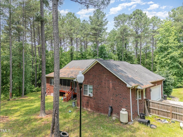 3304 Black Stallion Ct, Zebulon, NC 27597 - view of front of property featuring brick siding, stairs, a shingled roof, an attached garage, and driveway