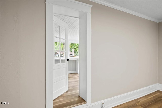 205 Forest Hill Ave, Rocky Mount, NC 27804 - hallway with wood finished floors, crown molding, and baseboards