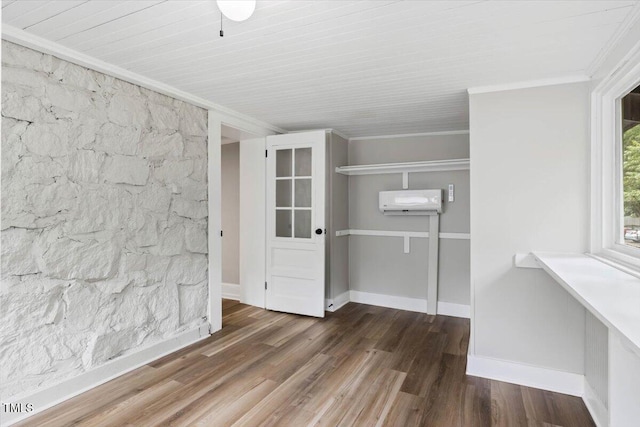205 Forest Hill Ave, Rocky Mount, NC 27804 - empty room with an AC wall unit, crown molding, wood finished floors, and baseboards