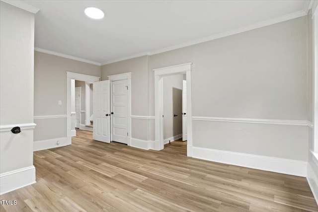 205 Forest Hill Ave, Rocky Mount, NC 27804 - empty room with light wood-style floors, ornamental molding, and baseboards