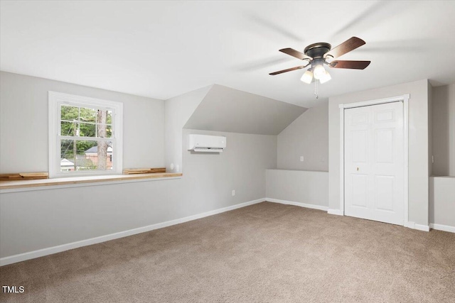 205 Forest Hill Ave, Rocky Mount, NC 27804 - additional living space featuring an AC wall unit, carpet floors, baseboards, a ceiling fan, and lofted ceiling