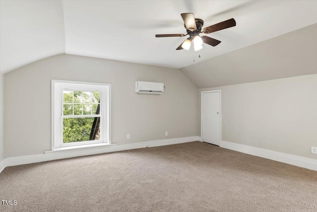 205 Forest Hill Ave, Rocky Mount, NC 27804 - additional living space featuring vaulted ceiling, a wall unit AC, carpet, baseboards, and a ceiling fan