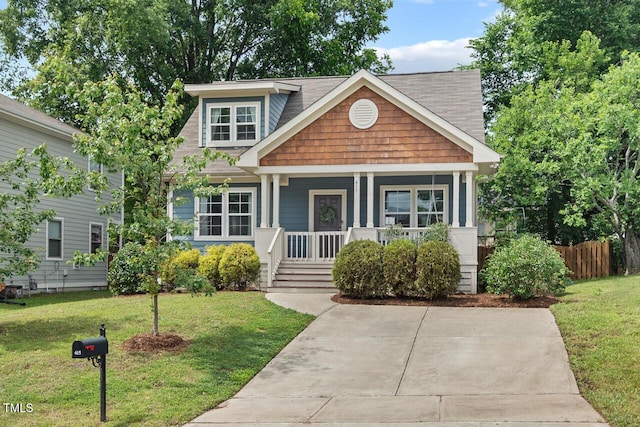 415 Dupree St, Durham, NC 27707 - view of front facade featuring covered porch and roof with shingles
