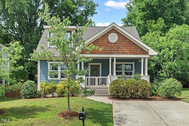 415 Dupree St, Durham, NC 27707 - view of front of property featuring a porch, a front lawn, and a shingled roof