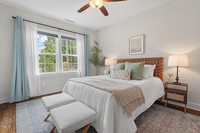 415 Dupree St, Durham, NC 27707 - bedroom featuring baseboards, wood finished floors, and a ceiling fan
