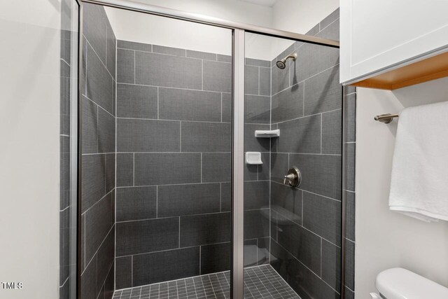 415 Dupree St, Durham, NC 27707 - full bathroom featuring a shower stall and toilet