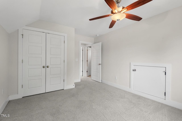 415 Dupree St, Durham, NC 27707 - unfurnished bedroom with carpet floors, baseboards, a closet, a ceiling fan, and vaulted ceiling