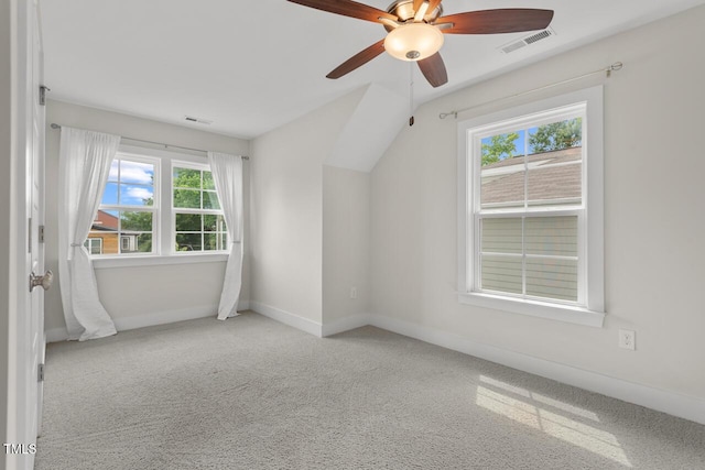 415 Dupree St, Durham, NC 27707 - additional living space with baseboards, ceiling fan, carpet floors, and vaulted ceiling