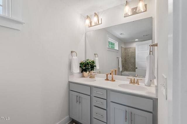 415 Dupree St, Durham, NC 27707 - full bath with double vanity, shower / tub combination, and baseboards