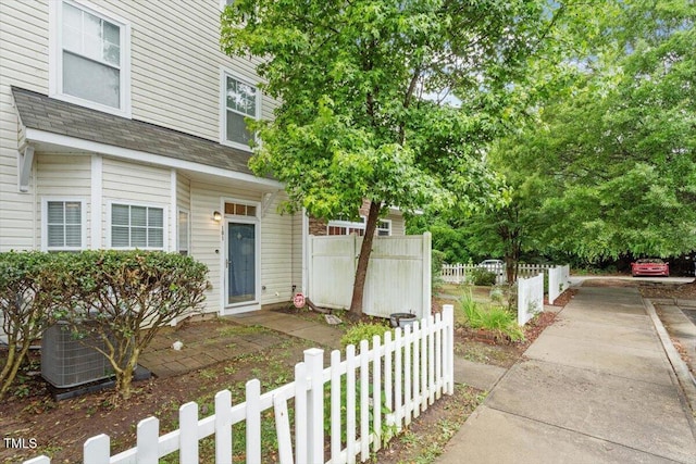 300 Gilman Ln Unit 101, Raleigh, NC 27610 - view of front of property with central AC and roof with shingles