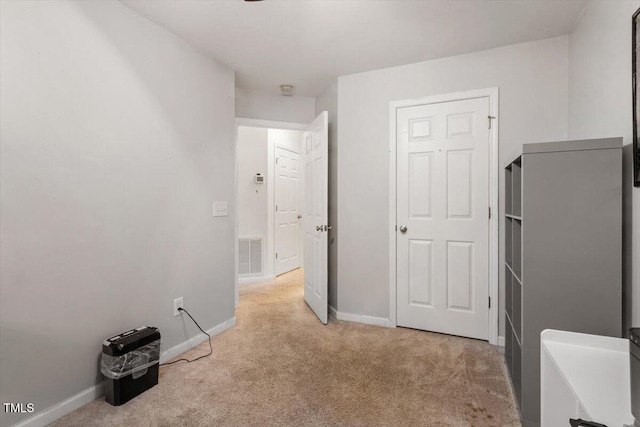 300 Gilman Ln Unit 101, Raleigh, NC 27610 - unfurnished bedroom featuring light carpet and baseboards