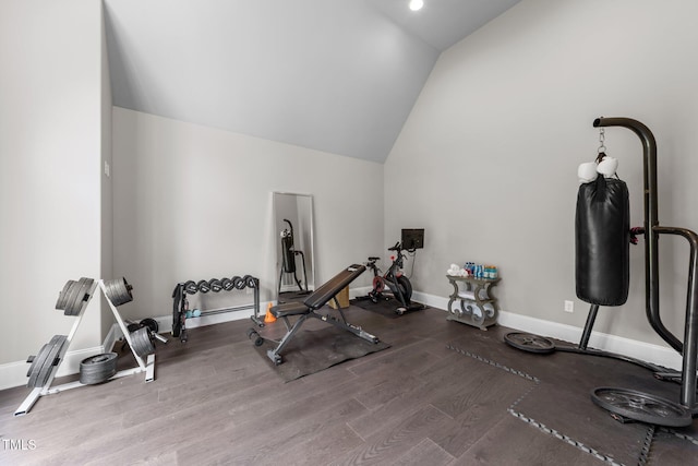 2220 Inwood Landing Ct, Raleigh, NC 27603 - workout area with vaulted ceiling, wood finished floors, and baseboards