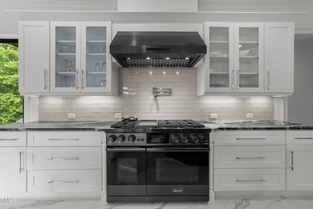 2220 Inwood Landing Ct, Raleigh, NC 27603 - kitchen featuring black gas range, ventilation hood, light marble finish flooring, dark stone countertops, and white cabinets