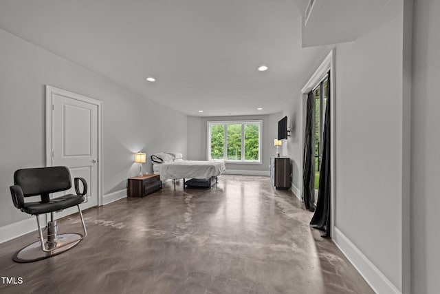 2220 Inwood Landing Ct, Raleigh, NC 27603 - bedroom featuring concrete flooring, baseboards, and recessed lighting