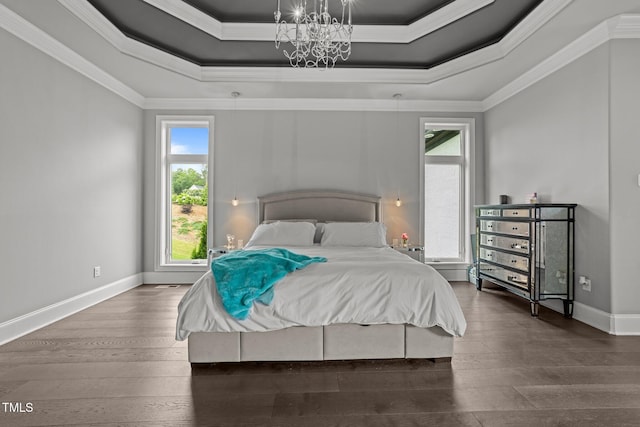 2220 Inwood Landing Ct, Raleigh, NC 27603 - bedroom with hardwood / wood-style floors, a tray ceiling, a chandelier, crown molding, and baseboards