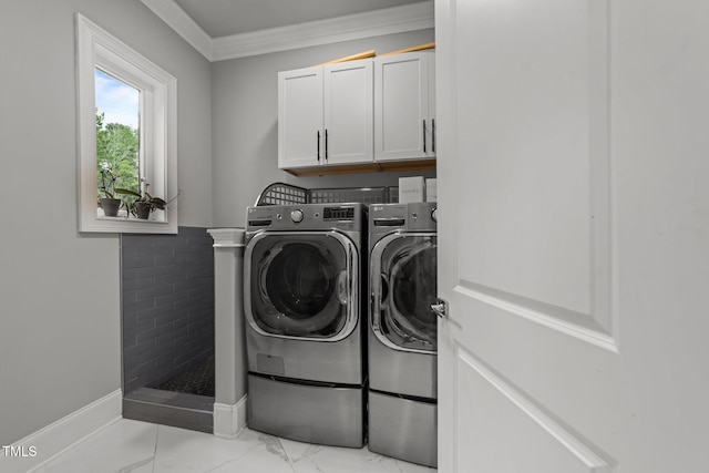 2220 Inwood Landing Ct, Raleigh, NC 27603 - laundry area with washer and dryer, light marble finish flooring, cabinet space, ornamental molding, and baseboards