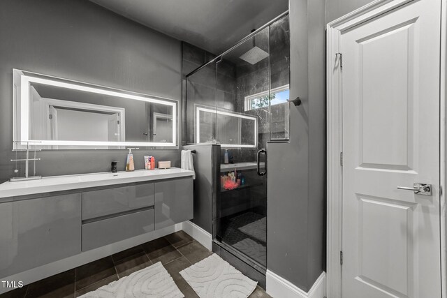 2220 Inwood Landing Ct, Raleigh, NC 27603 - full bath featuring a shower stall, vanity, and baseboards