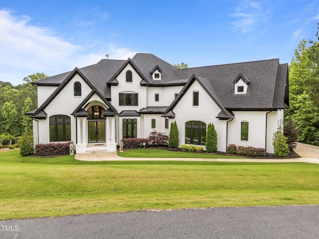 2220 Inwood Landing Ct, Raleigh, NC 27603 - french country style house featuring a front lawn