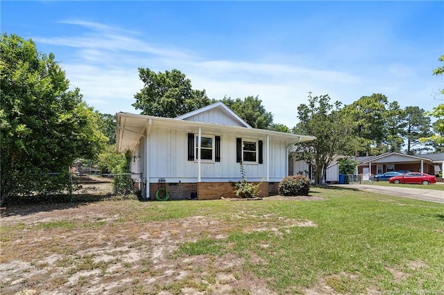 1926 Martindale Dr, Fayetteville, NC 28304 - view of front of home with board and batten siding and crawl space