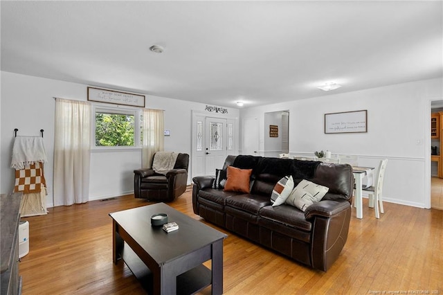 1926 Martindale Dr, Fayetteville, NC 28304 - living area featuring light wood-type flooring and baseboards