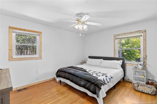 1926 Martindale Dr, Fayetteville, NC 28304 - bedroom featuring wood finished floors, baseboards, and ceiling fan