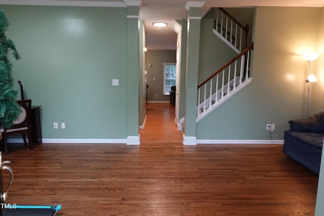 114 Calebra Way, Cary, NC 27519 - living area with baseboards, stairs, wood finished floors, and ornamental molding