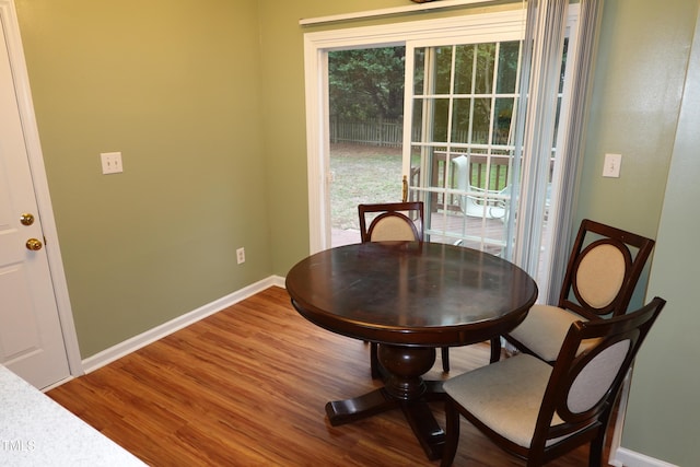 114 Calebra Way, Cary, NC 27519 - dining room featuring baseboards and wood finished floors