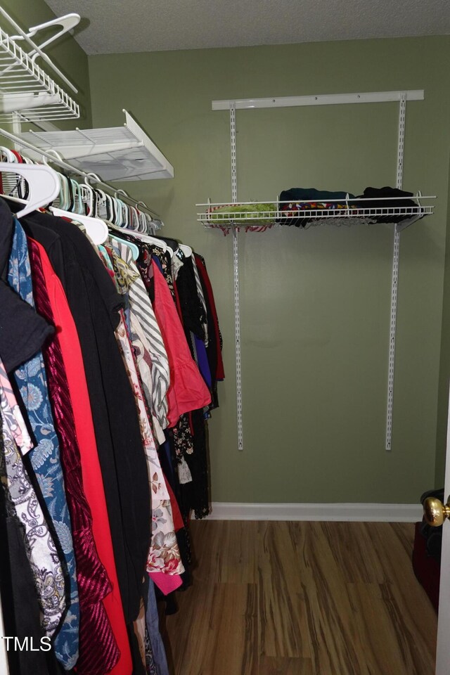 114 Calebra Way, Cary, NC 27519 - spacious closet featuring wood finished floors