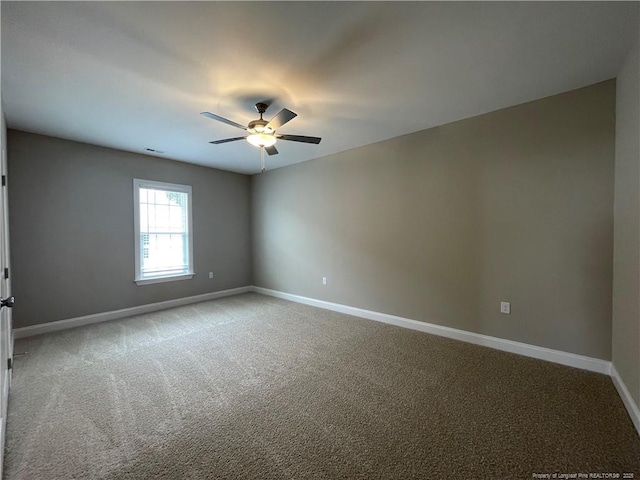 240 Gallery Dr Unit 301, Spring Lake, NC 28390 - carpeted spare room with baseboards and ceiling fan
