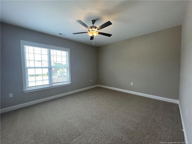 240 Gallery Dr Unit 301, Spring Lake, NC 28390 - carpeted empty room featuring a ceiling fan and baseboards