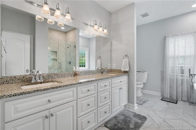 5387 Clubhouse Ln, Hope Mills, NC 28348 - full bath with marble look tiles, toilet, double vanity, a marble finish shower, and baseboards