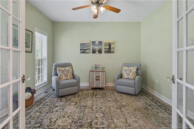 5387 Clubhouse Ln, Hope Mills, NC 28348 - living area with french doors, baseboards, and a ceiling fan