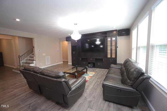 4416 Walker Hallow St, Raleigh, NC 27616 - living room with wood finished floors and stairway
