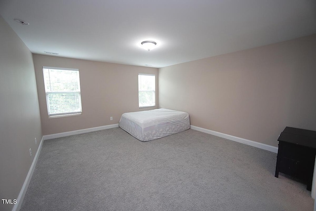 4416 Walker Hallow St, Raleigh, NC 27616 - unfurnished bedroom featuring baseboards and carpet flooring