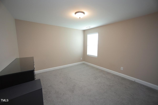 4416 Walker Hallow St, Raleigh, NC 27616 - spare room with baseboards and carpet floors
