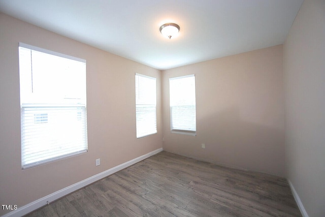 4416 Walker Hallow St, Raleigh, NC 27616 - unfurnished room with wood finished floors and baseboards
