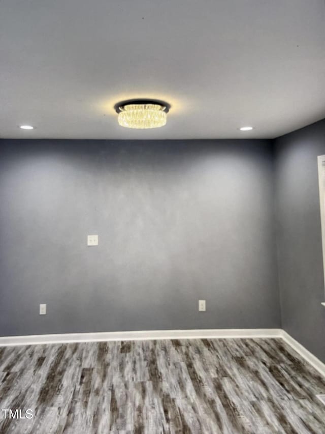 6905 Pine Creek Ct, Fayetteville, NC 28314 - unfurnished room with wood finished floors and baseboards
