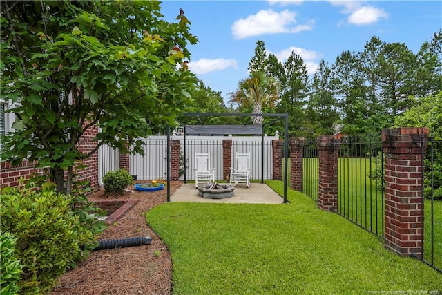 6500 Oakley Dr, Fayetteville, NC 28311 - view of yard featuring a patio and an outdoor fire pit