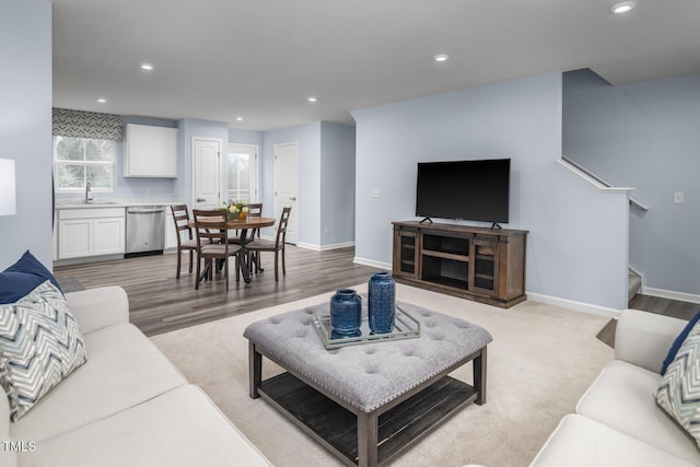 220 Gianna Dr, Lillington, NC 27546 - living area featuring recessed lighting, baseboards, light wood-style flooring, and stairs