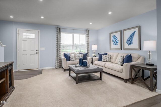 220 Gianna Dr, Lillington, NC 27546 - living area with healthy amount of natural light, baseboards, recessed lighting, and carpet floors