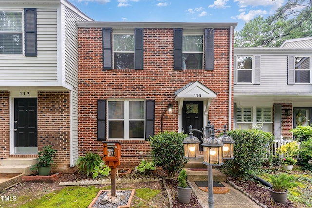 110 Taylors Pond Dr, Cary, NC 27511 - colonial inspired home featuring brick siding and entry steps