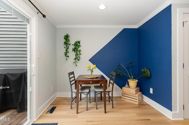 110 Taylors Pond Dr, Cary, NC 27511 - dining area with crown molding and wood finished floors